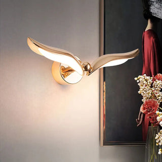 Sido gold bird inspired LED wall sconce – front view