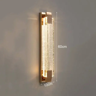 LUXENI gilded wall sconce close-up gold texture embellishment