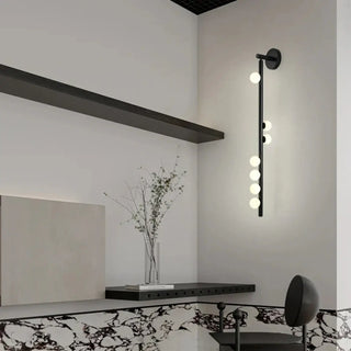 3-globe gold wall sconce installed – G9 LED 55cm 3000K indoor