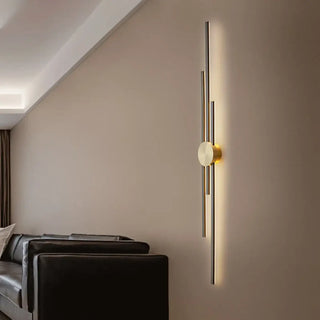 Modern 3-bar acrylic wall sconce close-up warm 3000K glow