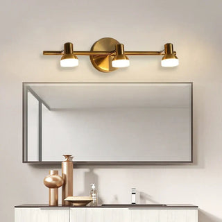 Three-light mirror sconce installed – vanity bedroom glam warm lighting