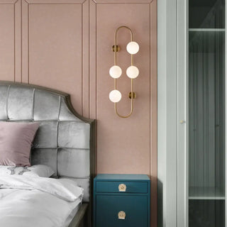 Nordic gold 4-light wall sconce G9 glass balls – 72cm front view