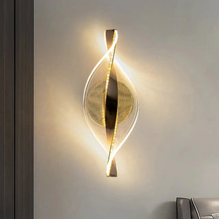 Twisted drop gold wall light 12x30cm – angle view
