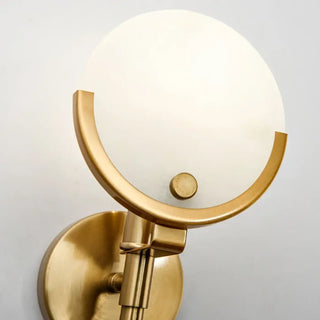 VISU gold aluminum wall sconce installed contemporary