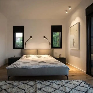 XIMMERI minimalist adjustable wall sconce installed