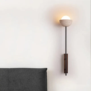 Slender marble half-sphere wall sconce close-up – black 4000g 3000K