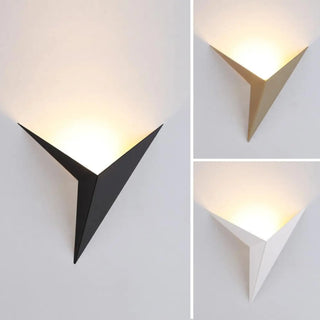 Star shaped wall sconce close-up gold detail