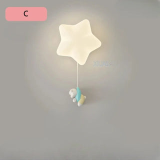 STARIA whimsical LED wall sconce star and figurines detail