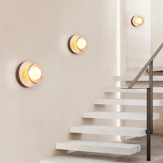 Sabia lunar wood wall sconce installed – warm light close-up