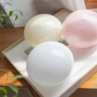 Colorful egg glass wall light – pastel pink yellow white