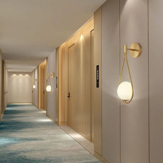 Gold water drop wall sconce G9 LED 12W in room — elegant ambient interior lamp