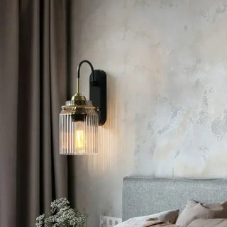 Black glass sconce close-up streaked texture E27