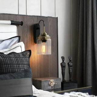 Industrial glass wall sconce installed view dining room