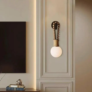 Brass LED wall sconce front view – white globe 3000K 35cm designer sconce