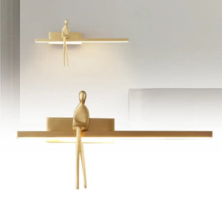 Sitting golden man wall light close-up – G9 5W metal acrylic