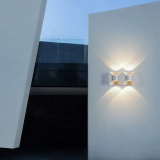 Architectural wall sconce shadow effect on wall detail
