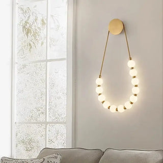 SUITY glam wall sconce gold finish globe diffusers