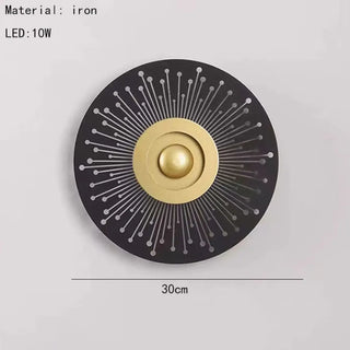 Gold iron sconce close-up 3000K LED warm glow