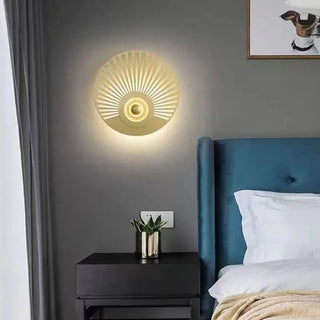 Black-gold iron LED wall sconce installed view