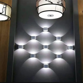 LED cylinder wall sconce black minimalist side view