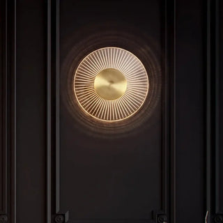 Ship gold sunburst sconce close-up detail bedroom