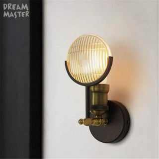 Black loft wall sconce G4 installed in urban interior