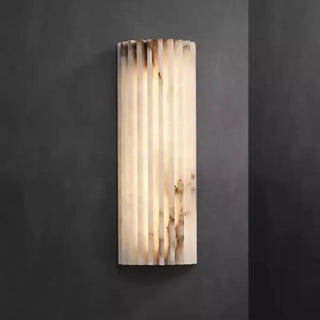 MARA veined marble sconce close-up natural stone texture
