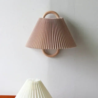 Minimalist accordion pleated wall sconce – fabric shade close-up
