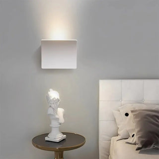 White curved minimalist sconce close-up – aluminum acrylic contemporary design