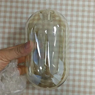 Glass brass wall sconce modern installed warm 3000K