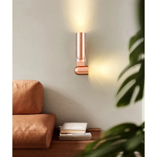 Pink cylindrical glass wall sconce – modern side angle
