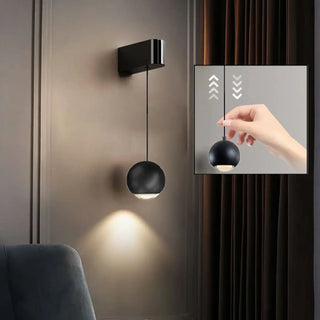 LUMIRRE wall sconce close-up adjustable arm detail