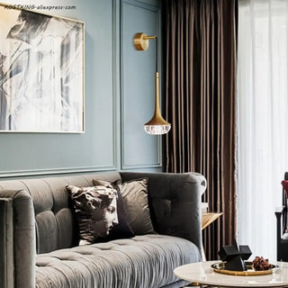 Modern brass and glass wall sconce LED in gold – front view