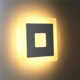 Square wall sconce installed view black modern bedroom