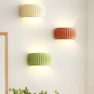 Sibede cream wall sconce close-up resin texture
