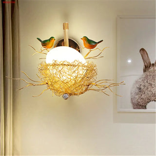 Golden nest bird art wall sconce – unique decorative lighting piece