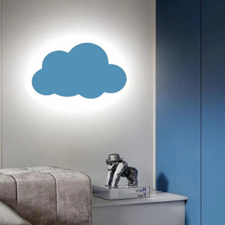 Blue cloud sconce installed – playful kids bedroom accent light