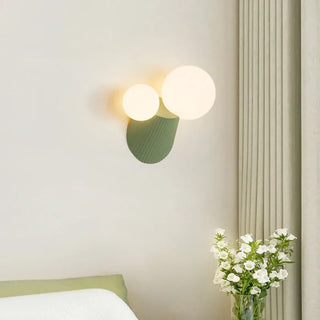 Glass 2-light wall sconce G9 IP65 canelé stand white balls – front view