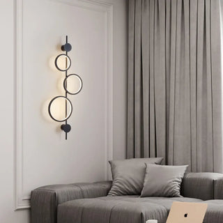 Black triple circle wall light side angle 35cm wide