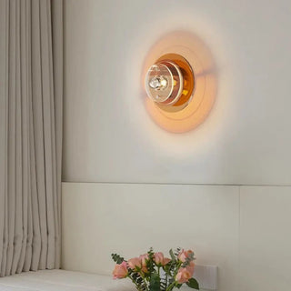 Spira artistic LED wall sconce close-up disc detail