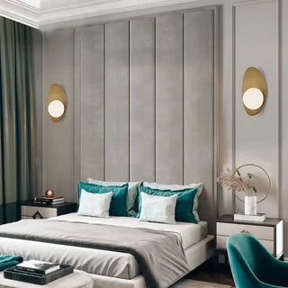 Elegant oval wall light gold aluminum – close-up