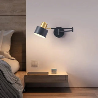 Adjustable swivel arm wall light E27 gold – installed
