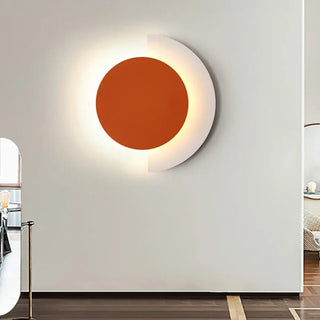 Post-modern acrylic wall sconce close-up – orange green black LED
