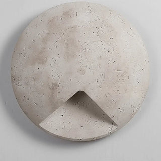 Round grey concrete wall sconce G9 LED – close-up texture