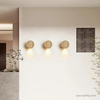 VOLCA volcanic stone wall sconce installed warm glow