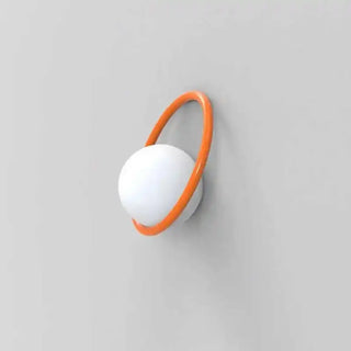 Colorful round wall sconce in orange – vibrant side angle