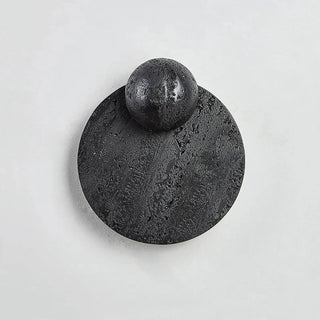 Round black volcanic stone sconce angle – 23×26cm sculptural fixture