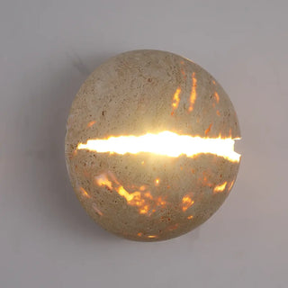 Split stone wall sconce warm 3000K glow installed view