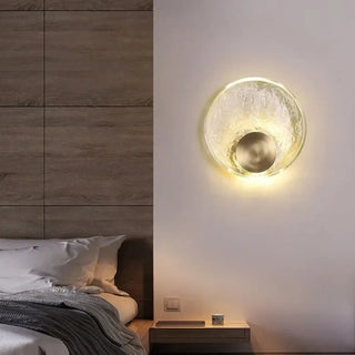 TRANSI transparent glass wall light gold support detail