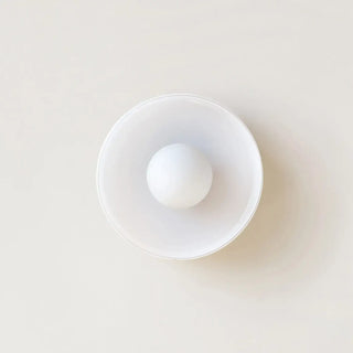 Glass ball wall sconce close-up G9 3000K warm